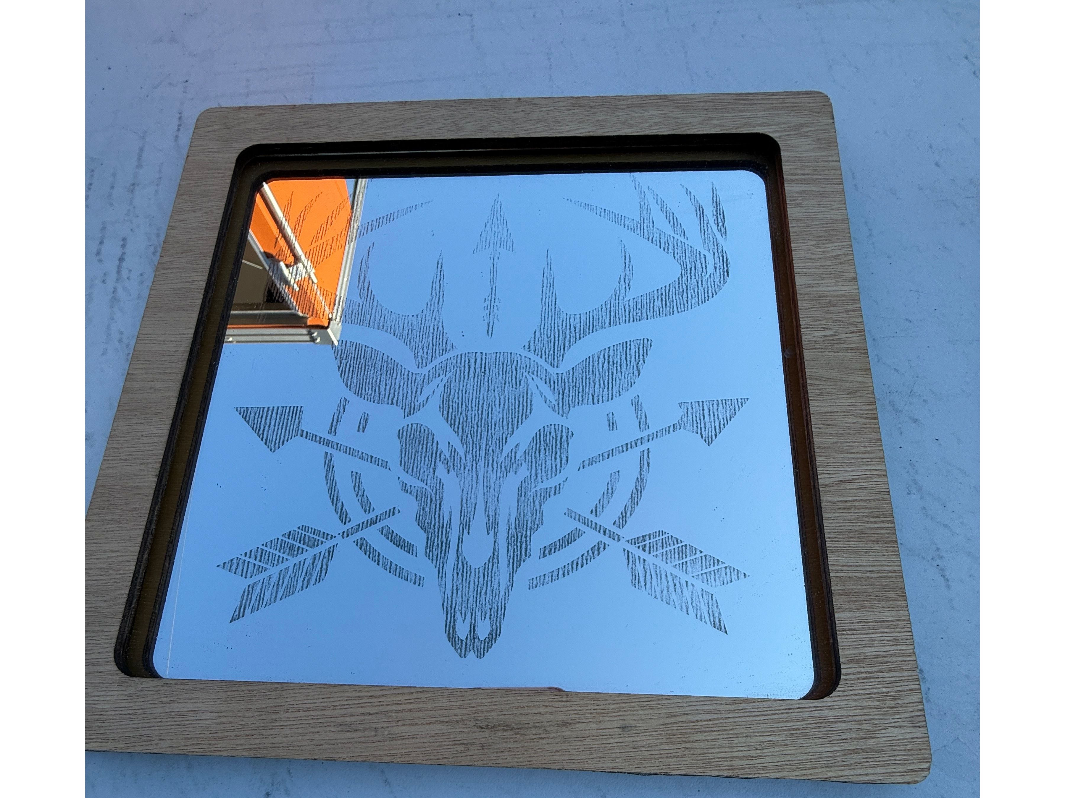 Deer and crossbow mirror incased